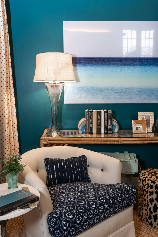 Example of a small beach style freestanding desk carpeted study room design in New York with blue walls and no fireplace