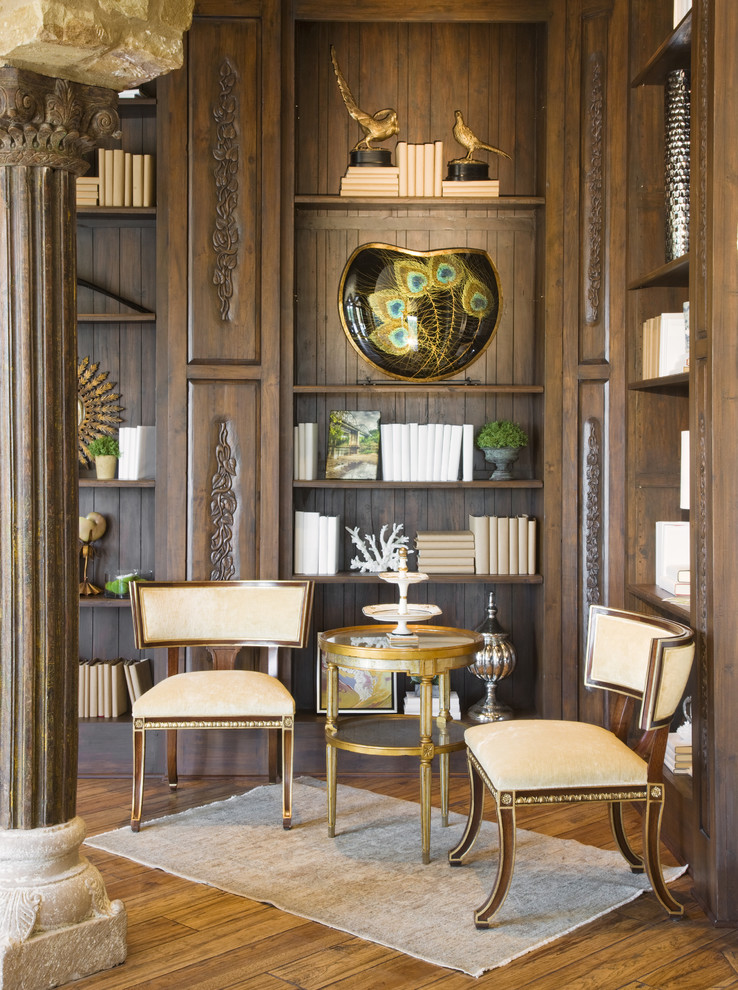Tuscan medium tone wood floor home office photo in Austin