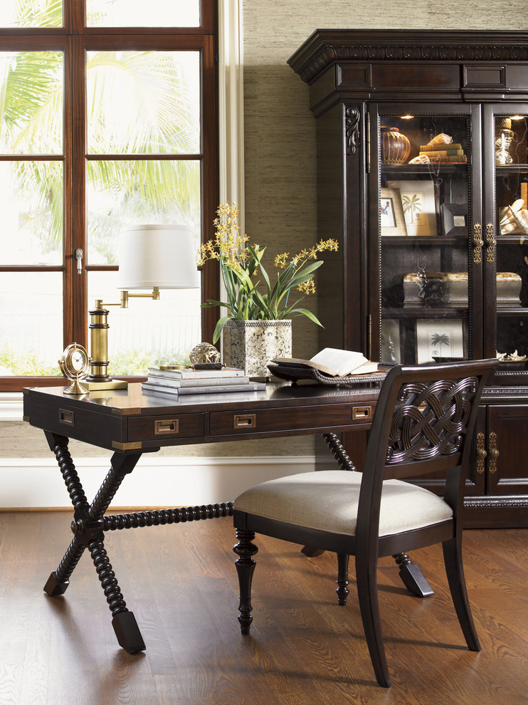 Medium sized classic study in Orange County with medium hardwood flooring, a freestanding desk and grey walls.