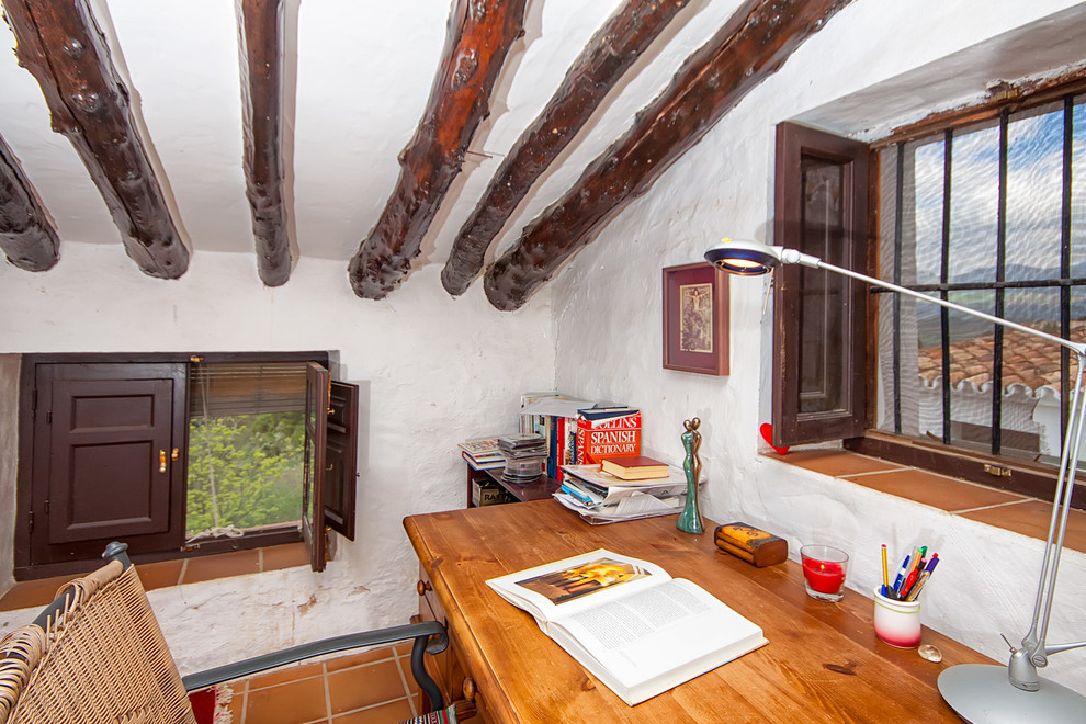 Example of a tuscan home office design in Malaga