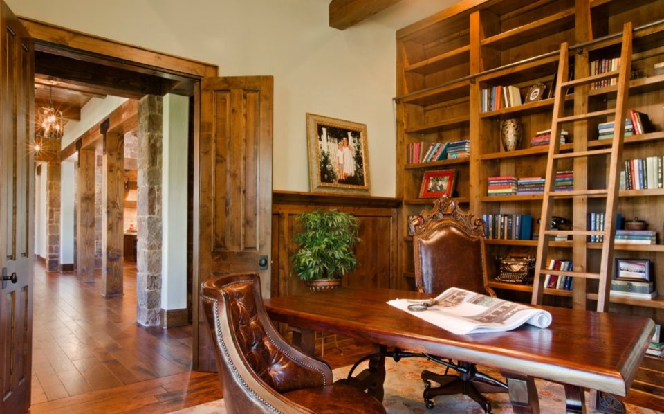 This is an example of an eclectic home office in Austin.