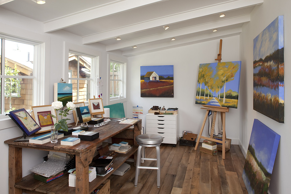 Home studio - rustic freestanding desk dark wood floor home studio idea in San Francisco with white walls