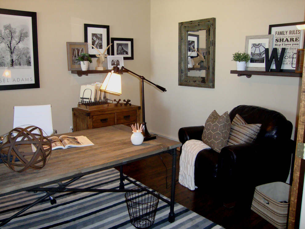 This is an example of a medium sized eclectic study in Dallas with beige walls, dark hardwood flooring, no fireplace and a freestanding desk.