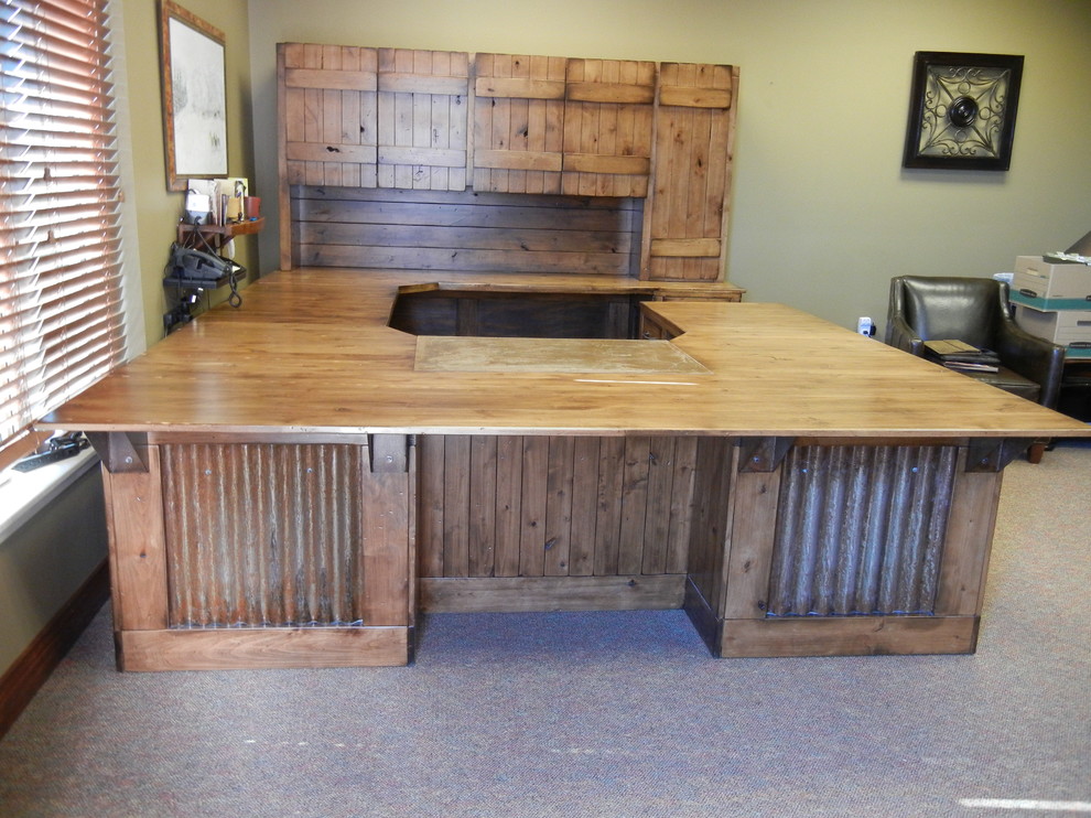 Home office - large rustic freestanding desk home office idea in Omaha