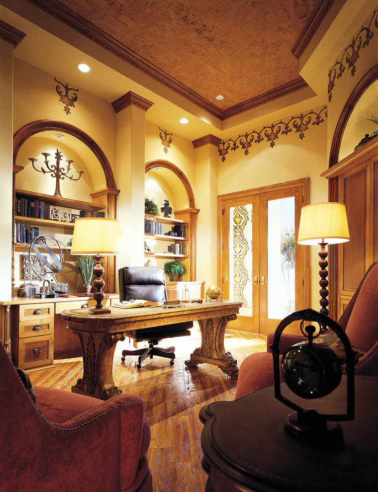 Example of a tuscan home office design in Miami