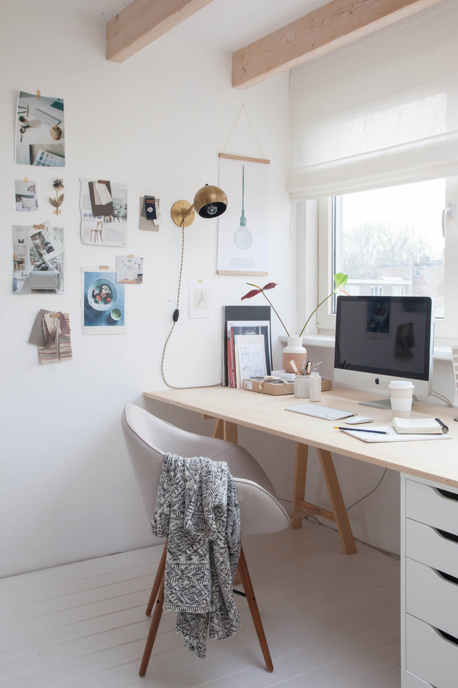 Home studio - small scandinavian freestanding desk painted wood floor home studio idea in Amsterdam with white walls and no fireplace