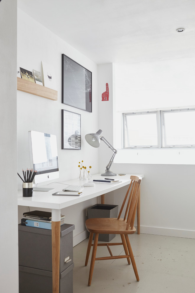 Scandi home office in London with white walls, no fireplace and a freestanding desk.