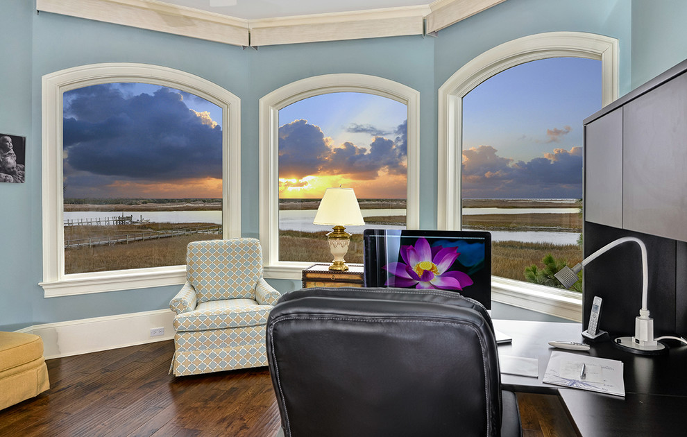 Example of an island style home office design in Charleston