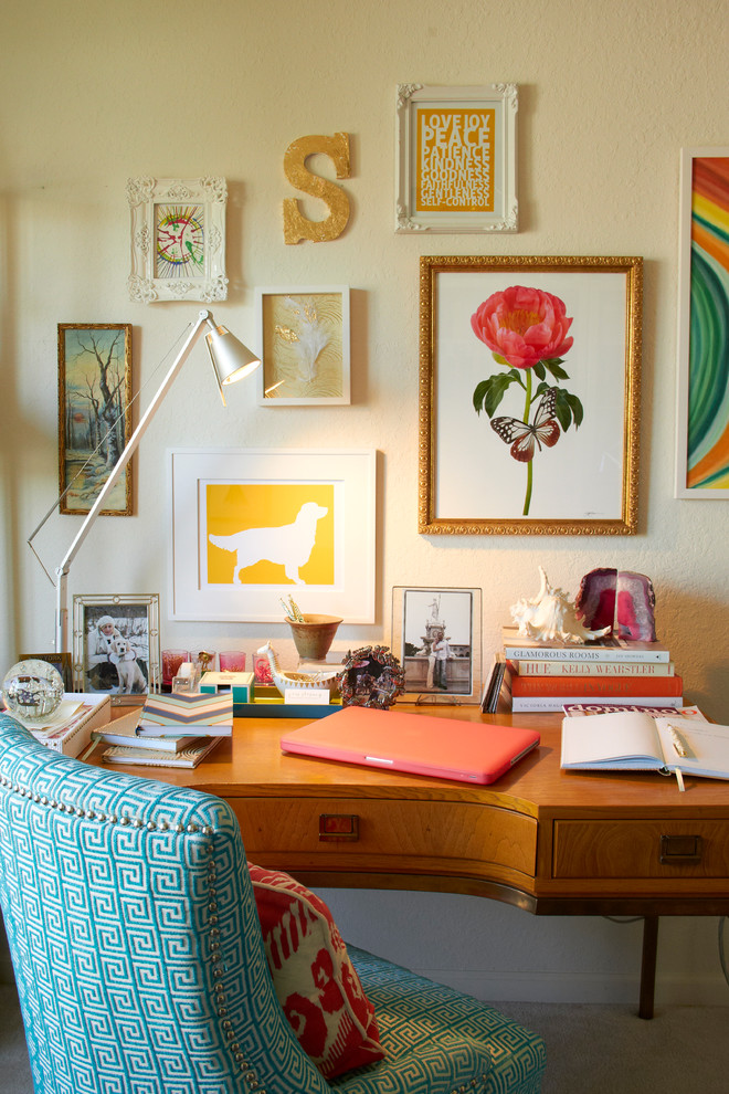 Small elegant freestanding desk study room photo in Milwaukee with beige walls