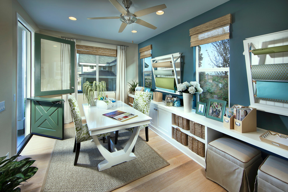 Example of a transitional home office design in Orange County