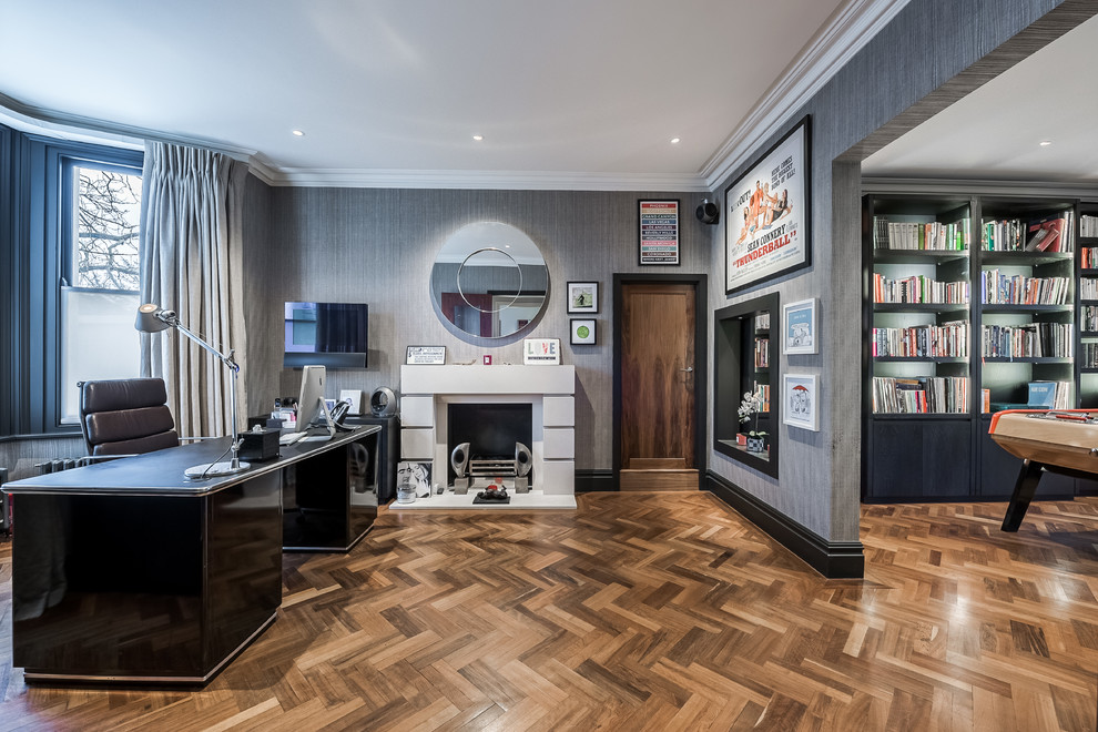 Example of a trendy home office design in London