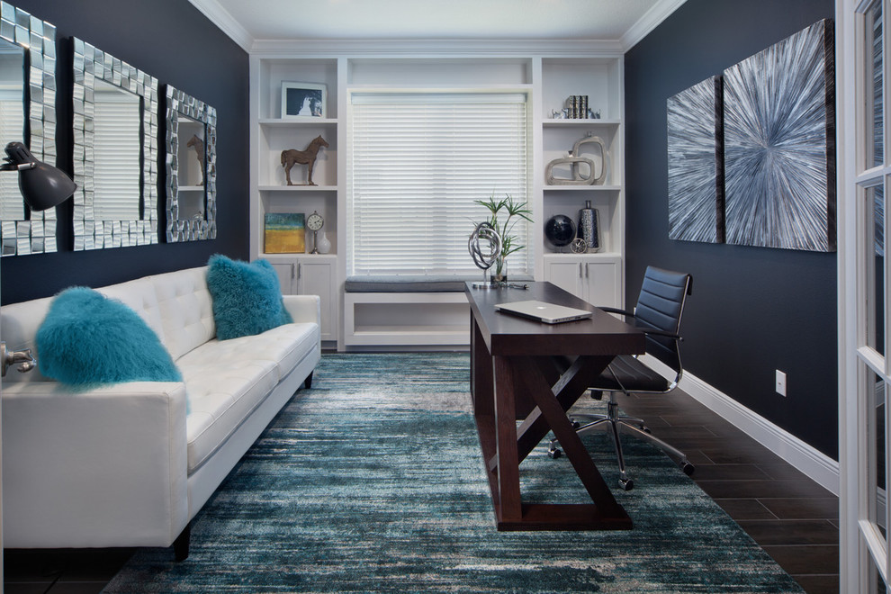 Inspiration for a mid-sized transitional freestanding desk porcelain tile study room remodel in Orlando with black walls