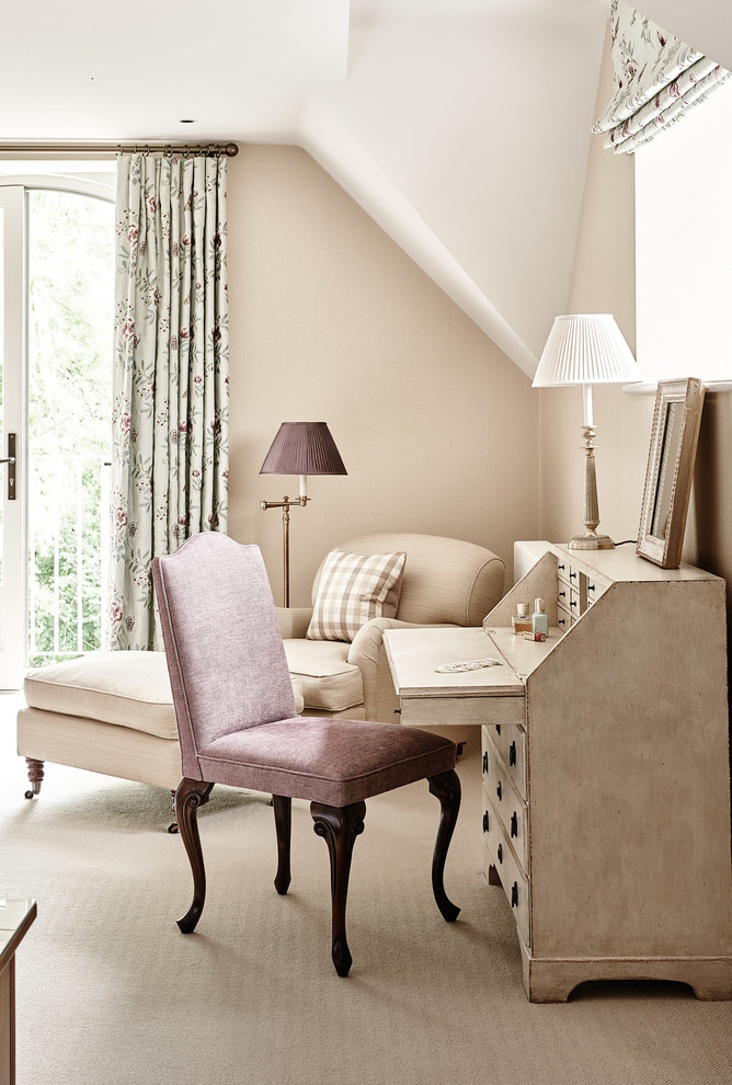 Inspiration for a classic study in Wiltshire with beige walls, carpet, a freestanding desk and beige floors.