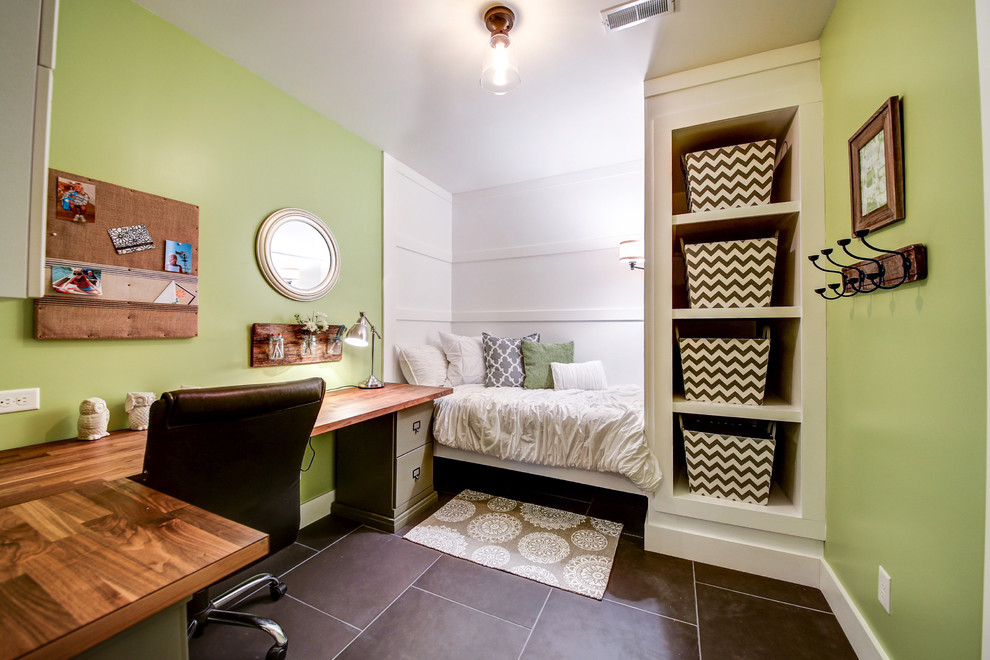 Photo of a medium sized traditional study in Dallas with green walls, a built-in desk, porcelain flooring and grey floors.