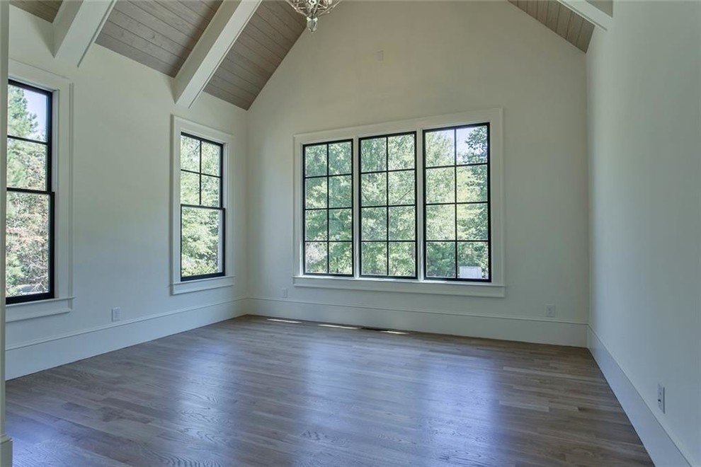 Inspiration for a mid-sized transitional light wood floor and gray floor study room remodel in Atlanta with white walls
