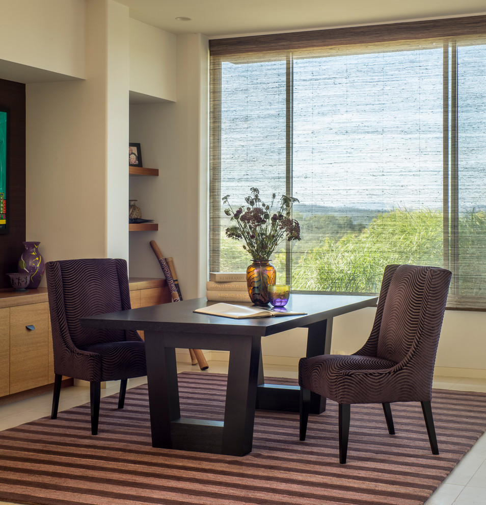 Inspiration for a traditional study in San Francisco with beige walls, a freestanding desk and travertine flooring.