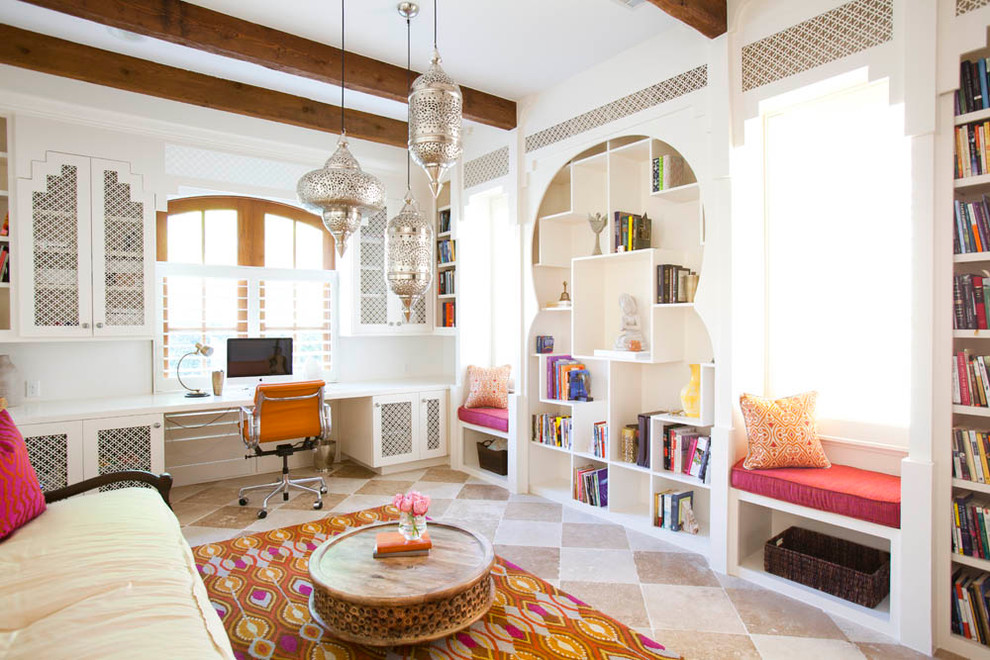 Home office - mediterranean built-in desk home office idea in Houston
