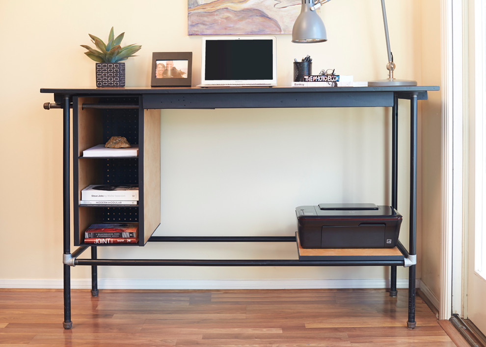 Design ideas for a medium sized urban home studio in San Diego with a freestanding desk.