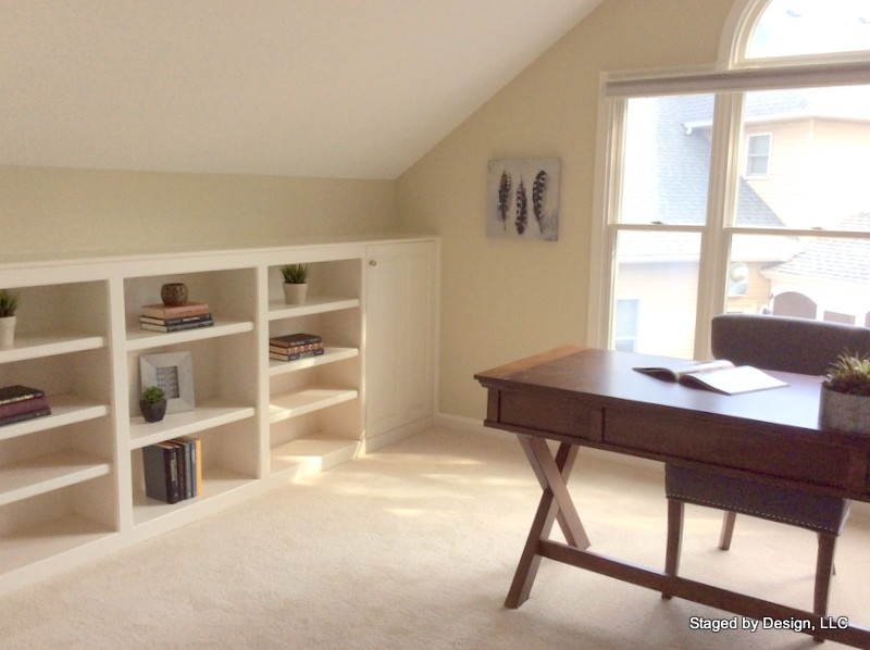 Inspiration for a mid-sized transitional freestanding desk carpeted study room remodel in DC Metro with beige walls