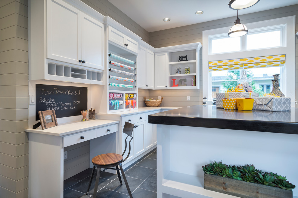 Example of a trendy gray floor craft room design in Portland