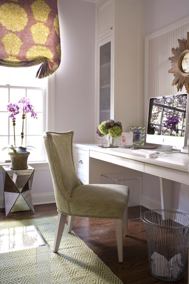 Transitional built-in desk home office photo in New York