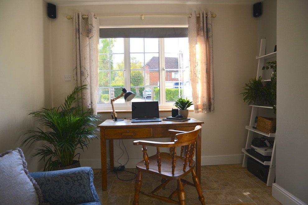 Example of a cottage home office design in Sussex