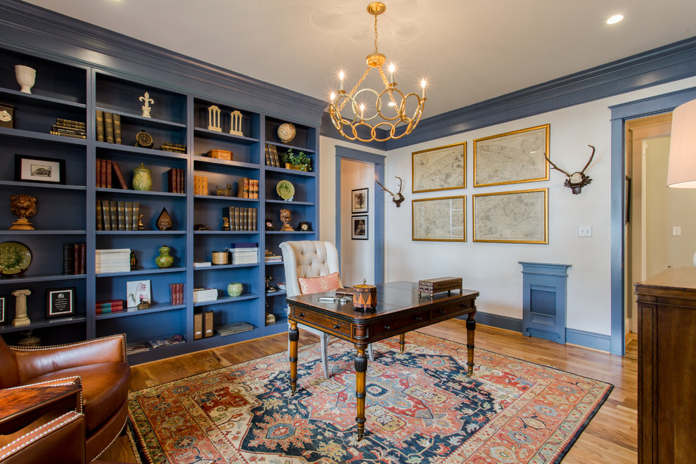 Inspiration for a classic study in Richmond with white walls, medium hardwood flooring and a freestanding desk.