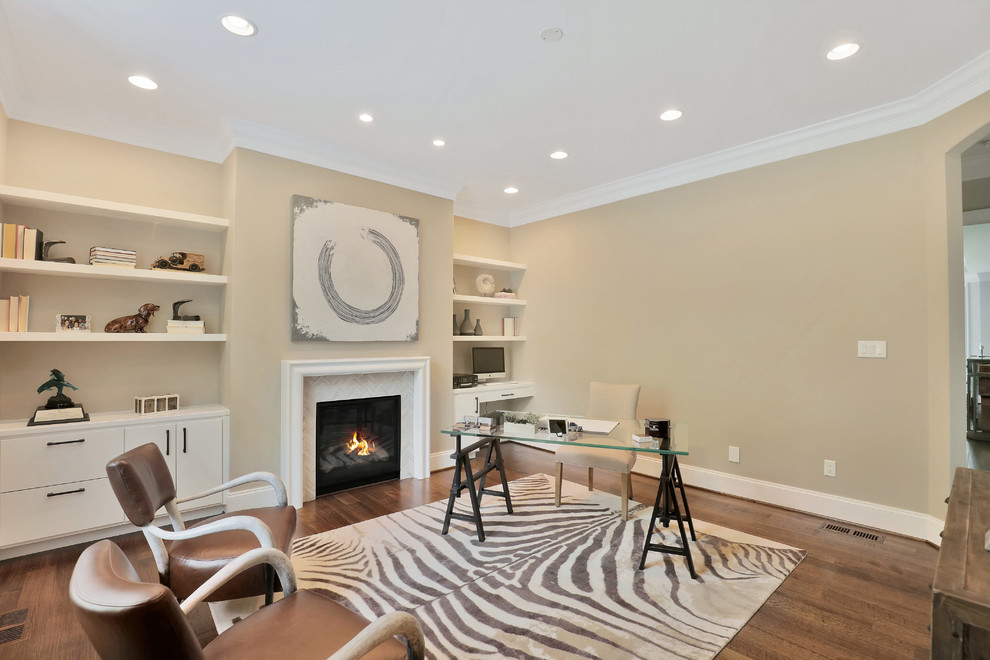 This is an example of a medium sized classic home office in Richmond with beige walls, medium hardwood flooring, a standard fireplace, a tiled fireplace surround and a freestanding desk.