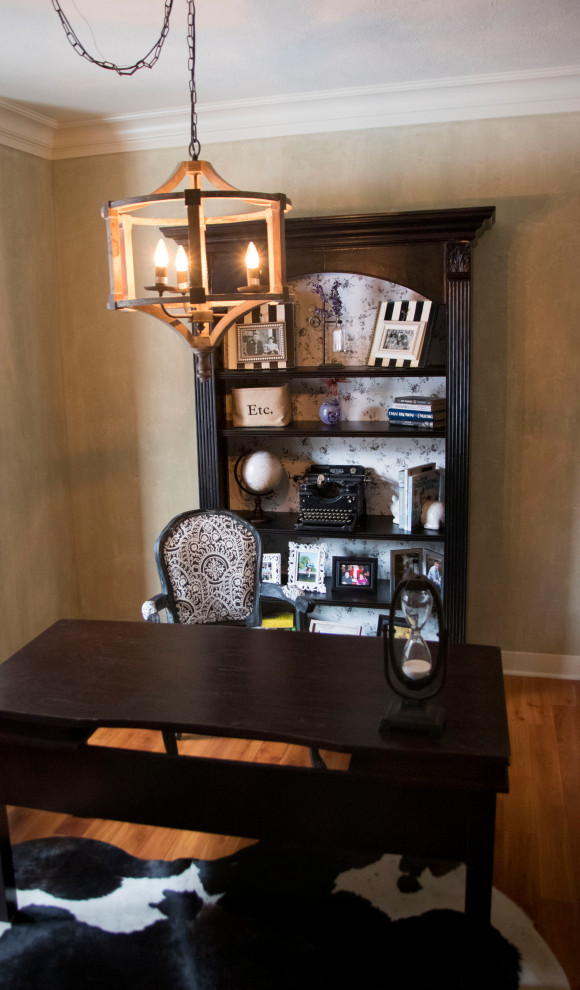 Inspiration for a medium sized traditional home office in Grand Rapids with brown walls, dark hardwood flooring, a freestanding desk and brown floors.