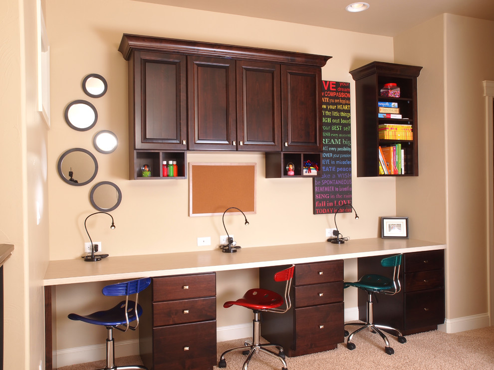 This is an example of a classic home office in Denver with a built-in desk.