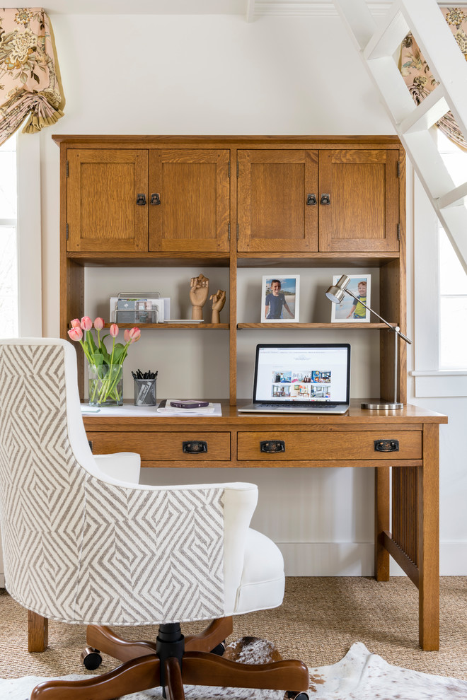 Example of a small transitional freestanding desk home office design in Boston with white walls