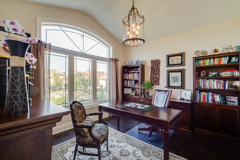 Inspiration for a classic home office in Vancouver with beige walls, dark hardwood flooring and a freestanding desk.