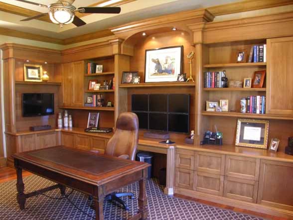 Example of a large classic freestanding desk carpeted study room design in Miami with beige walls and no fireplace