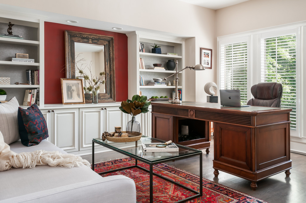 This is an example of a medium sized classic study in Atlanta with beige walls, a freestanding desk, medium hardwood flooring and grey floors.
