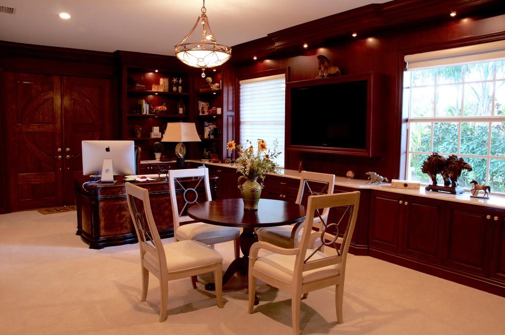 Photo of a large classic home office in Miami with carpet and a freestanding desk.