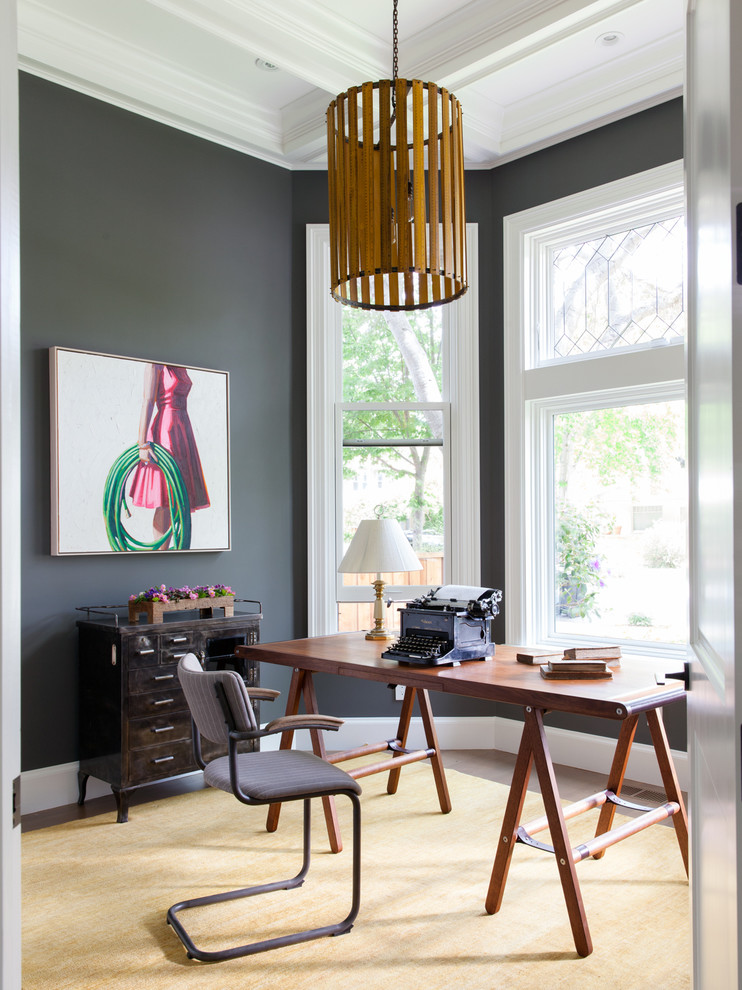 Inspiration for a transitional freestanding desk dark wood floor home office remodel in San Francisco with gray walls