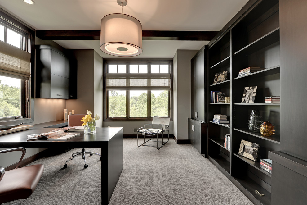 Inspiration for a transitional built-in desk carpeted home office remodel in Minneapolis with gray walls and no fireplace