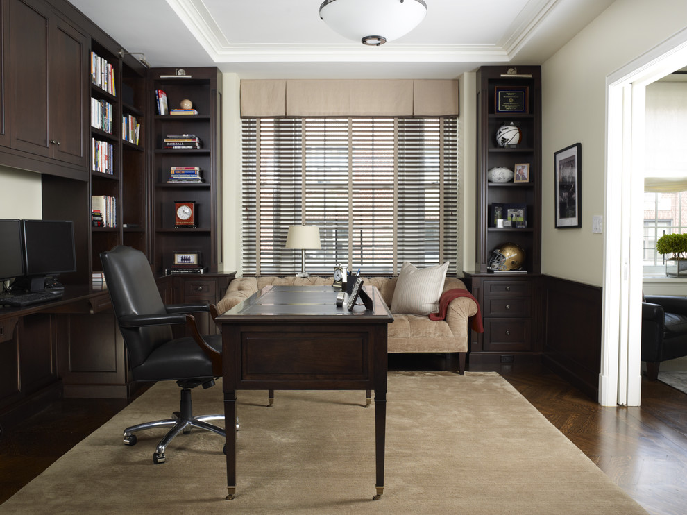Inspiration for a mid-sized timeless freestanding desk dark wood floor and brown floor home office remodel in New York with white walls and no fireplace