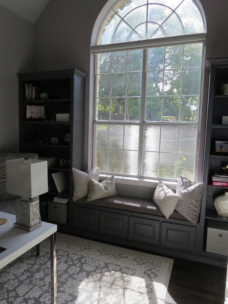 Design ideas for a large traditional study in Austin with grey walls, dark hardwood flooring and a freestanding desk.
