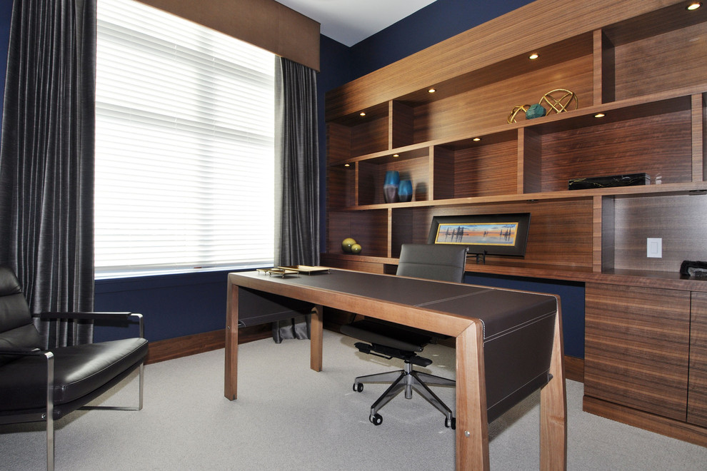 Inspiration for a mid-sized contemporary freestanding desk study room remodel in Vancouver with blue walls