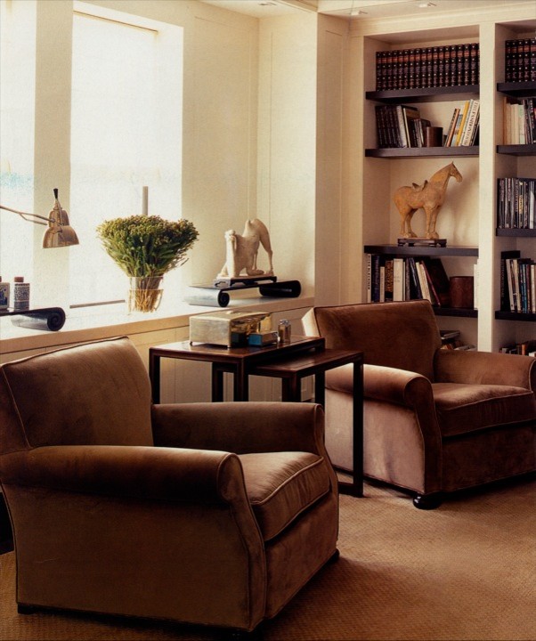 Photo of a medium sized world-inspired study in New York with a freestanding desk, beige walls, carpet and beige floors.