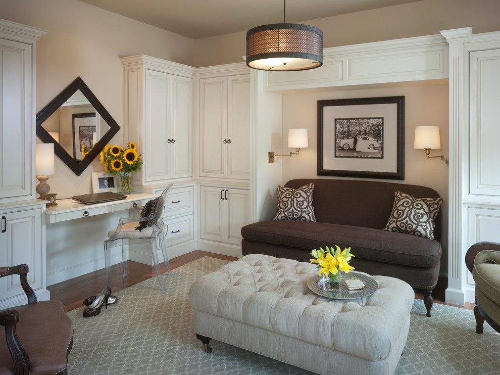 Medium sized contemporary home office in Philadelphia with beige walls, bamboo flooring and a built-in desk.