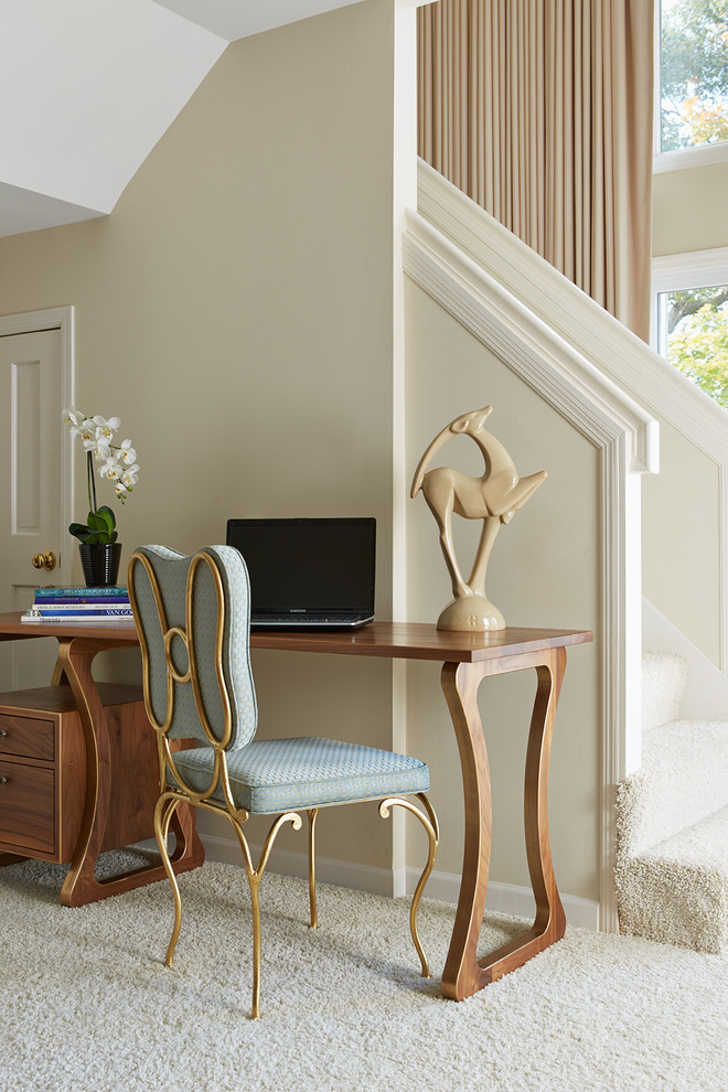 Photo of a medium sized eclectic home office in Minneapolis with beige walls, carpet and a freestanding desk.