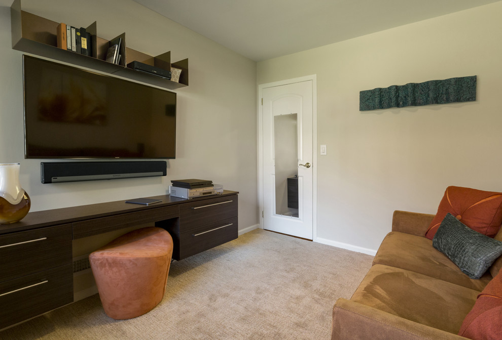 Small trendy built-in desk carpeted study room photo in New York with beige walls