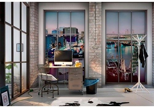 Imagen de despacho urbano de tamaño medio con paredes multicolor, suelo de cemento y escritorio independiente