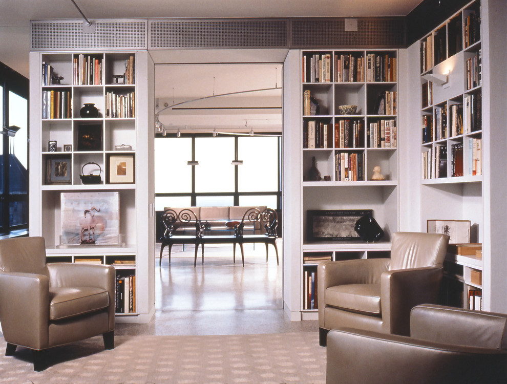 Идея дизайна: домашняя библиотека среднего размера в стиле лофт с белыми стенами, бетонным полом и серым полом