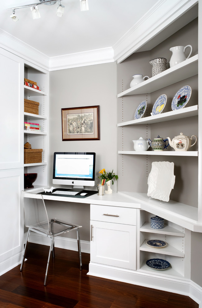 Design ideas for a traditional home office in DC Metro with a built-in desk.