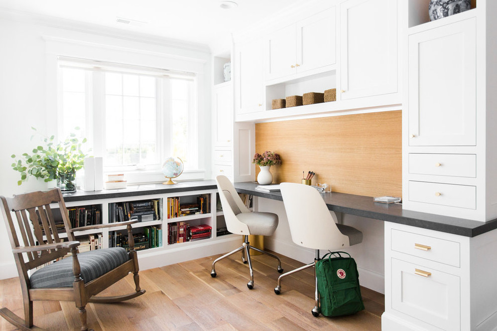 Inspiration for a large coastal built-in desk medium tone wood floor home office remodel in Salt Lake City