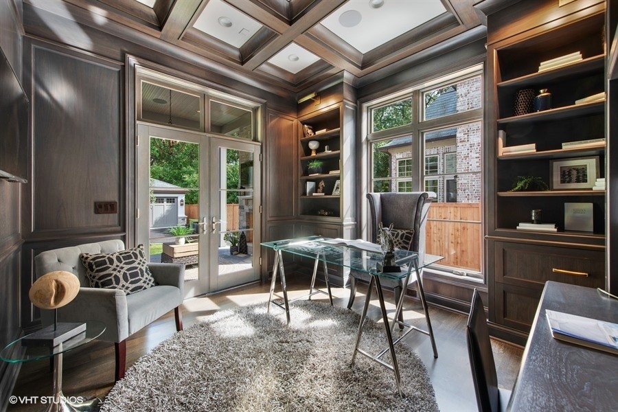 Inspiration for a medium sized classic home office in Chicago with a reading nook, grey walls, medium hardwood flooring, no fireplace, a built-in desk and brown floors.