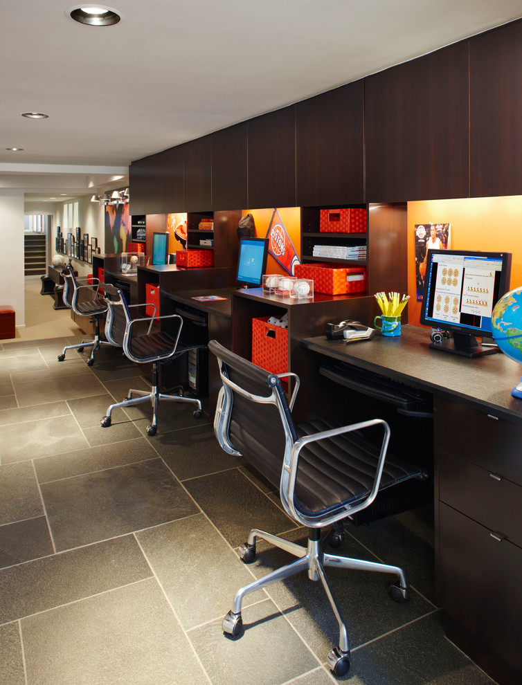 Example of a trendy built-in desk home office design in Detroit